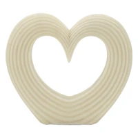 Kép 1/7 - Lovvy szív alakú figura quartz fehér 30x7x26 cm