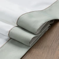 Kép 5/5 - sandi-asztalterito-olivazold-szinu-szeles-peremmel-natur-145-x-350-cm-hajtogatott-anyag