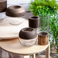 Kép 4/4 - grace1-02-dekorativ-gyertyatarto-uvegbol-es-fabol-feher-barna-15-x-26-cm-hs396848-hangulatkep-1