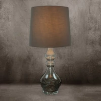 Kép 2/5 - tiana-asztali-lampa-matt-szovetbuaval-acelszurke-32-x-38-x-76-cm-felkapcsolva