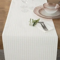 Kép 2/3 - karacsonyi-asztalterito-kockas-jacquard-anyagbol-arany-szallal-pezsgo-40-x-140-cm-hangulatkep