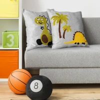 Kép 2/2 - dino1-puha-gyerek-parnahuzat-himzett-dinoval-szurke-sarga-45-x-45-cm-hangulatkep
