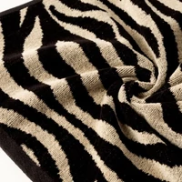 Kép 4/4 - Zebra mintás jacquard törölköző Fekete/bézs 70x140 cm 3db 3